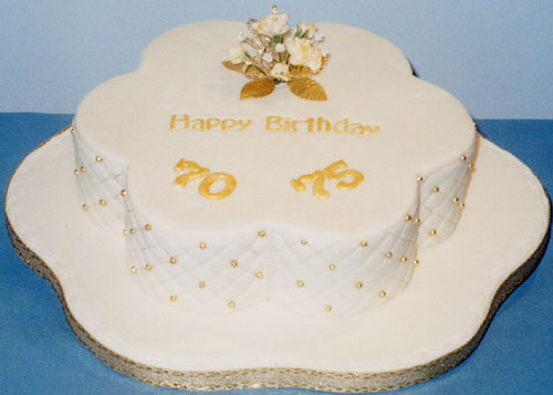 A joint 70th and 75th birthday cake.