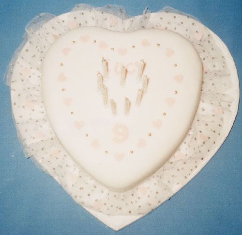 A heart shaped cake with a lace frill.  For my own daughter's 9th birthday.